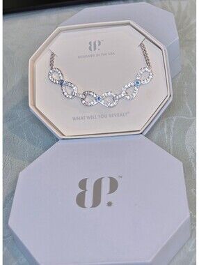 BP Infinity Bound Rhodium Plated Necklace with Aqua Blue Lab